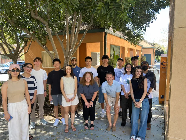 TRIP program members gathered outdoors for a group photo.