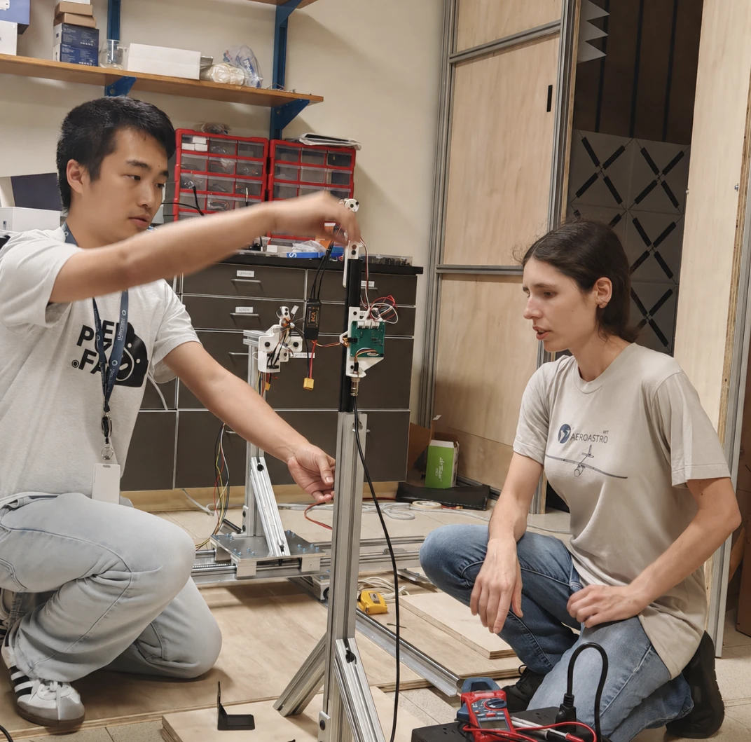 Me discussing a test stand design with Prof. Jacqueline Huynh in the lab